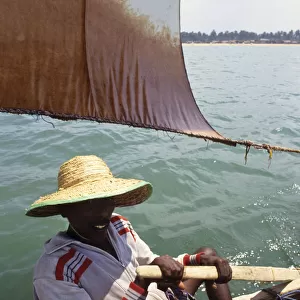 Sri Lankan fisherman in outrigger boat - 4
