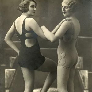 Two stylish Swimwear models posing with a beach ball