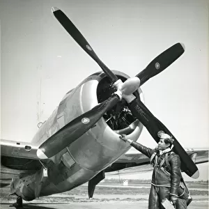 Test pilot Gerard Demunk - front of Curtiss-Wright propeller