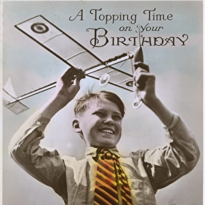 Topping Time on your Birthday - Happy Boy with a Model Plane