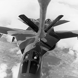 A USAF General Dynamics F-111E refuels