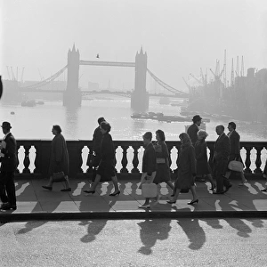 Walking across London Bridge 1950s