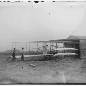 Wilbur and Orville Wright with their Second Powered Machine Print, 1904 Wilbur and Orville Wright with their Second Powered Machine Print, 1904