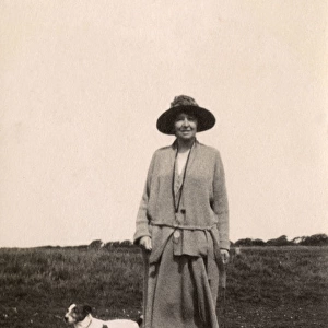 Woman out walking with a dog, Eastbourne, Sussex