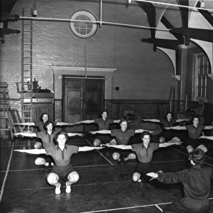 Women police officers training in a gym, London