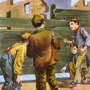 Four young boys playing a game with a stick and a stone