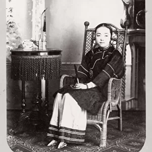 Young Chinese woman with bound feet, China
