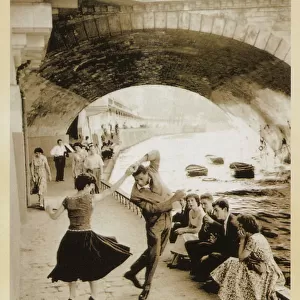 Young North Africans dancing on the Paris Quais