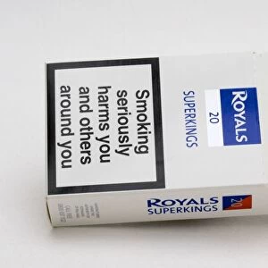 Cigarettes - Red white and blue packet of Royals Superkings cigarettes with smoking seriously damages health warning UK