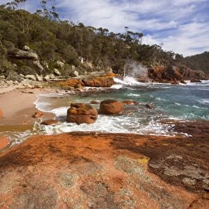 Granite coastline - view along the ragged, rocky coastline in Sleepy Bay - Freycinet National Park, Tasmania, Australia
