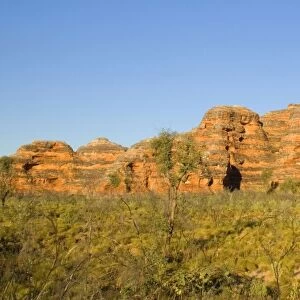 Sandstone Domes - famous banded, beehive-shaped domes, the world's most exceptional example of cone karst formations, in late evening light - Bungle Bungle National Park, Purnululu National Park, Western Australia, Australia