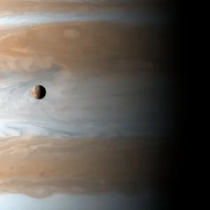 Io and Jupiter Print, a photograph of Io orbiting Jupiter