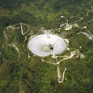 Upgraded Arecibo radio telescope with subreflector