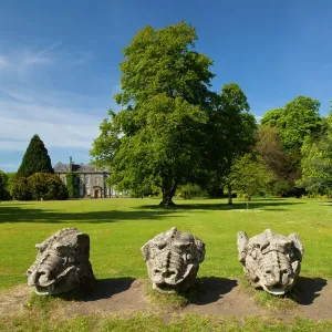 Carved Stone Dragon Heads Print of Wallington Hall Gardens