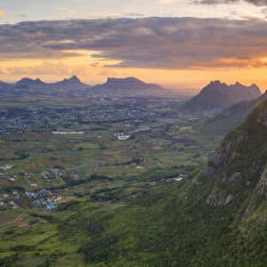 Aerial panoramic of sunset over Le Pouce and Pieter Both mountains, Moka Range, Port
