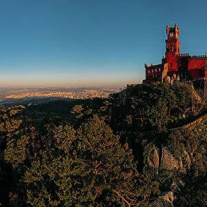 Aerial panoramic view of Pena Palace, a romanticist castle in the Sintra mountains of Portugal - UNESCO World Heritage Site