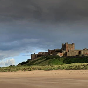 Bamburgh Castle and beach near Lindisfarne, Northumberland, England, United Kingdom