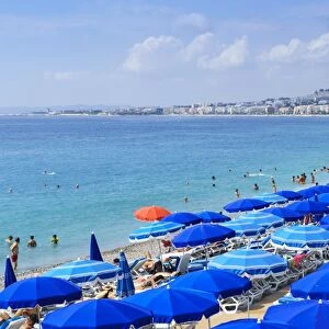 Blue parasols on the beach, Promenade des Anglais, Nice, Alpes Maritimes, Cote d Azur