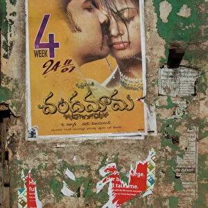 Bollywood movie poster on wall, Hospet, Karnataka, India, Asia