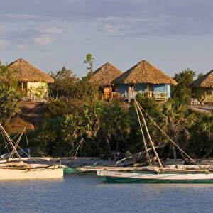 Bungalows and fishing boats at the Antsanitian Beach Resort, Mahajanga