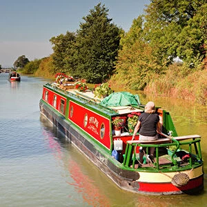 Canal boats idling their way down the Kennet and Avon Canal, Wiltshire, England, United Kingdom, Europe