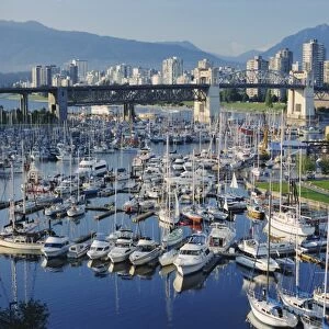 City centre seen across marina in Granville Basin, Vancouver, British Columbia, Canada