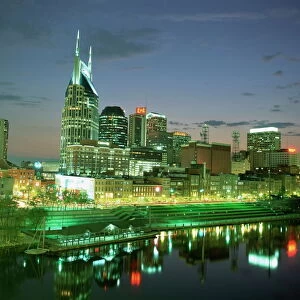 City skyline and Cumberland river at dusk
