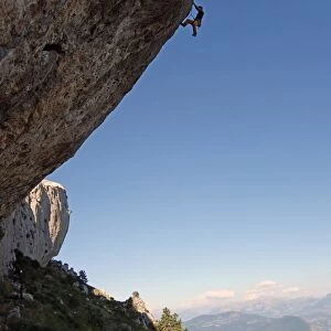 A climber ascends a difficult route on the cliffs of Ceuse, a mountain in the Alpes Maritimes