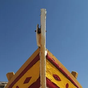 Close up of the prow of a traditional painted fishing boat