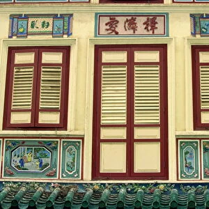 Close-up of closed shutters on doors and windows and