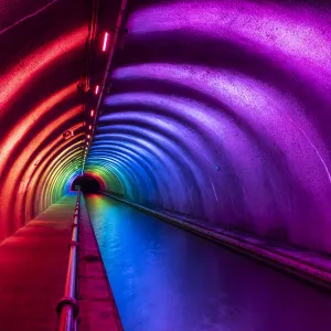 Colourful illuminated interior of the Roughcastle Tunnel at night, Edinburgh and Glasgow Union Canal, Falkirk, Scotland, United Kingdom, Europe