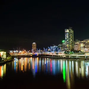 Colourful reflection of city skyline in Brisbane River at night, Brisbane, Queensland, Australia, Pacific