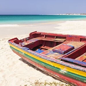 Colourful traditional local fishing boat on the beach at Santa Maria, Praia da Santa Maria