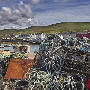 Crab pots piled up on the wharf at Portmagee, Skelligs Ring, Ring of Kerry, County Kerry