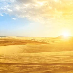 Desert landscape sand dunes at sunset near Qatar and Saudi Arabia border on Persian Gulf