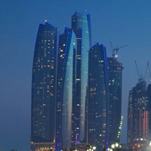 Emirate Towers and car tail lights at night, Abu Dhabi, United Arab Emirates, Middle East