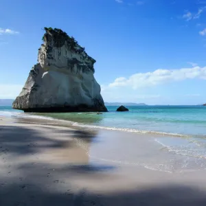 Giant rock on the sandy beach of Cathedral Cove, Coromandel, North Island, New Zealand, Pacific