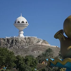 Golden sculpture on road roundabout & Incense burner (Riyam monument), Muscat, Oman