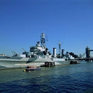 HMS Belfast moored near Tower Bridge on the Thames, London, England, United Kingdom