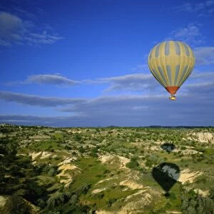 Hot air ballooning above Cappadocian landscape