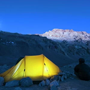 Illuminated tent at Plaza de Mulas base camp, Aconcagua 6962m, highest peak in South America
