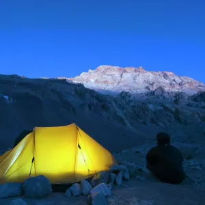 Illuminated tent at Plaza de Mulas base camp, Aconcagua 6962m, highest peak in South America