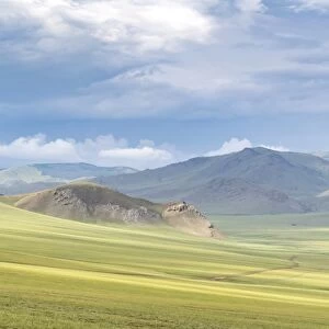 Landscape of the green Mongolian steppe under a gloomy sky, Ovorkhangai province