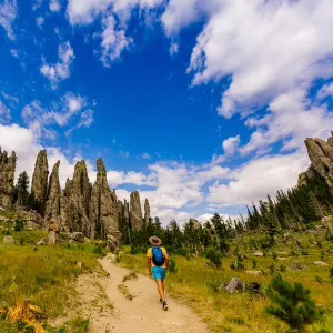 Man hiking the trails and enjoying the sights in the Black Hills of Keystone