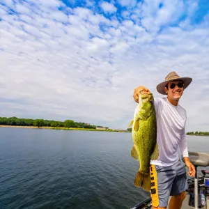 Man showing off his big catch of the day fishing on Yellowstone River, South Dakota