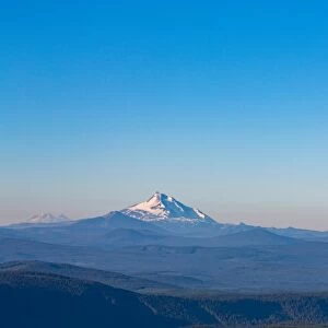 Mount Jefferson and mist over Trillium Lake, seen from Mount Hood, part of the Cascade Range