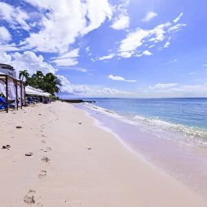 Paynes Bay, luxury sun loungers and cabanas on fine pale pink sand beach