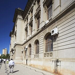 People walking past City Hall, Maputo, Mozambique, Africa