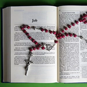 Prayer beads over an open Bible, Eure, France, Europe