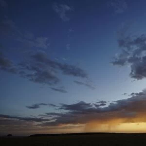 Rain and sunset on the Msai Mara plains, Kenya, East Africa, Africa